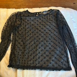 black mesh shirt with stars.